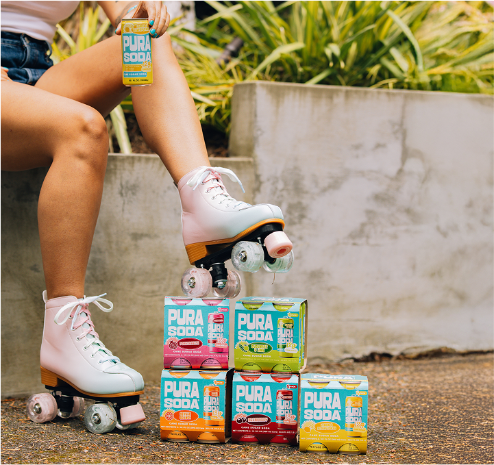 Woman on skates with Pura Soda